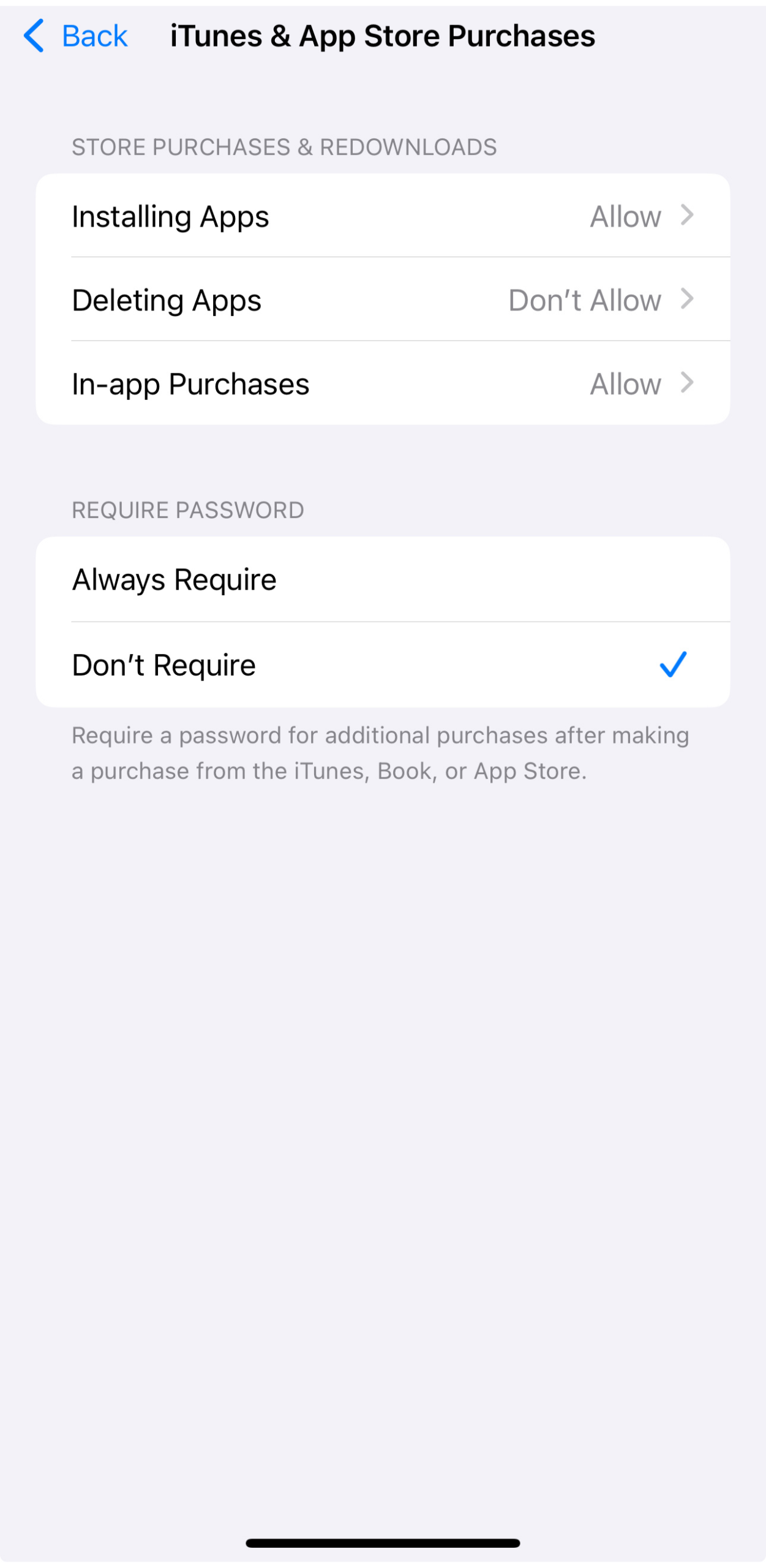 iTunes & App Store settings with app deletion disabled.